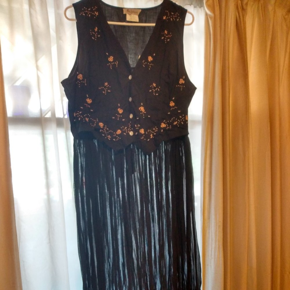 Sheer black dress with attached vest
